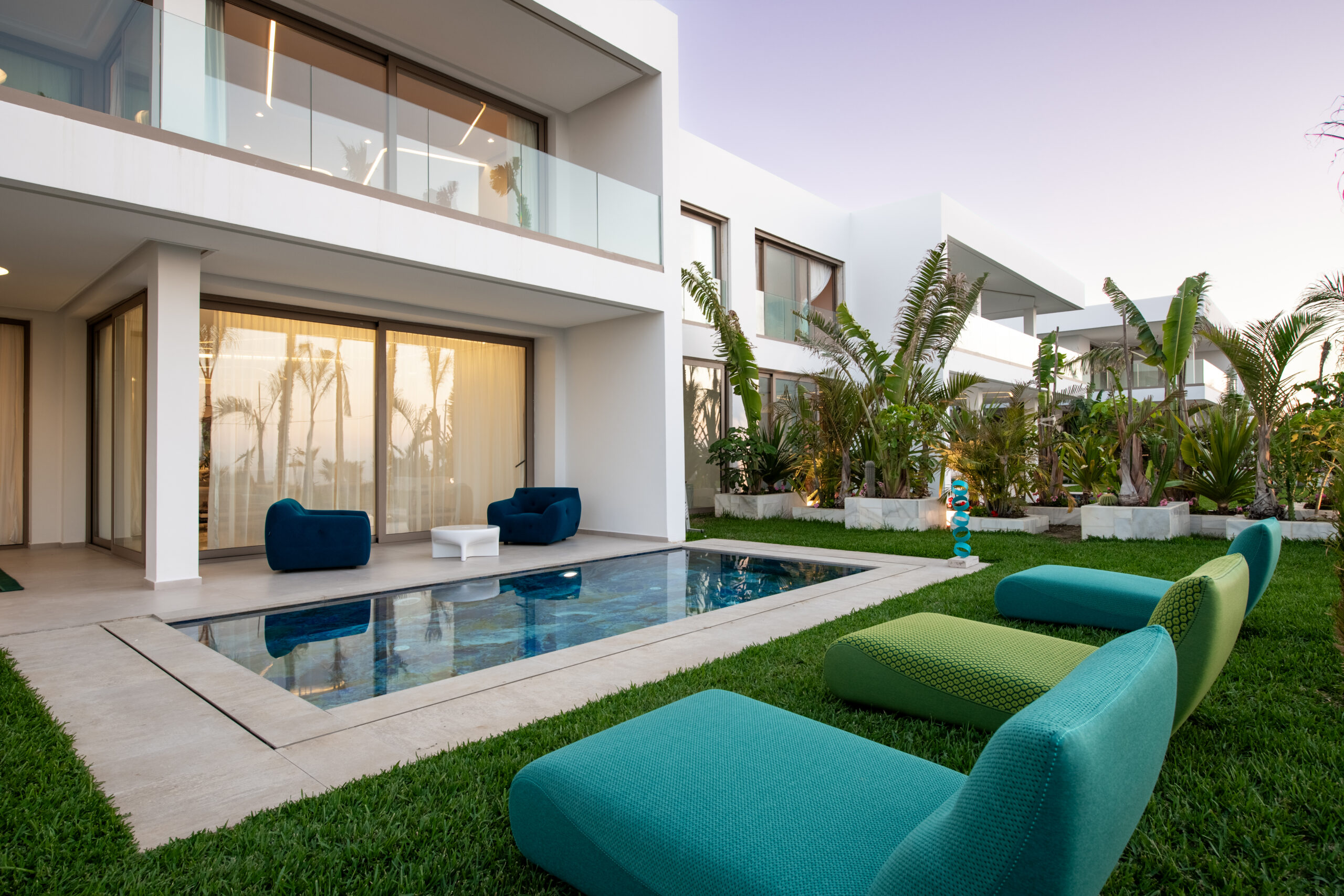 Luxury villa in Tangier overlooking the Mediterranean Sea at sunset.